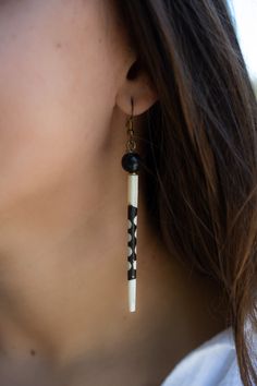 Cow Horn brown and white earrings, Handmade Uganda, African, Jewelry, Orphanage support,non profit, dangle earrings D E T A I L S: ✦ M A T E R I A L: Cow Horn and brass wire. The earrings are handmade from beginning to end. The cow horn are carved into a unique shape and then stained if needed. As they are handmade, each pair is one-of-a-kind and they can look different from the pictures listed. ❤︎︎︎︎︎︎︎︎︎︎︎︎︎  S A V E * B U Y * M O R E  Use the code "LOVE2" and get 10% OFF when you buy 2 items. Use the code "LOVE3" and get 15% OFF when you buy 3 or more items. ❤︎︎︎︎︎︎︎︎︎︎︎︎︎ Make an impact TODAY: - Help build a Community School in Masaka Village for African children. - Help Children's Home to become self-sufficient through agriculture and poultry. - Incentive Ugandan woman to sell their a White Beaded Pierced Earrings For Gift, Handmade White Dangle Plug Earrings, White Pierced Drop Plug Earrings, Adjustable White Dangle Plug Earrings, African Children, Cow Horns, African Jewelry, White Earrings, Non Profit