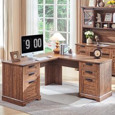 a wooden desk with a clock on it