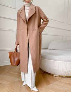 "Casual design style , long, oversized double- side handmade wool coat with viscose lining, The only coat you'll need come fall and winter, wool coat features a boxy silhouette, oversized lapels, and roomy sleeves. Crafted from 30% wool, it's designed to keep you warm and comfortable through colder seasons. Very suitable for your daily wear, party, travel, work, school, indoors and outdoor walks, spending time with family, shopping, etc. It is very comfortable and beautiful to wear The coat has Oversized Beige Wool Coat For Workwear, Oversized Long Wool Coat For Work, Oversized Long Wool Coat Single Breasted, Oversized Long Sleeve Wool Coat For Office, Oversized Long Outerwear For Work, Oversized Long Wool Coat For Office, Oversized Long Wool Coat, Tan Wool Coat, Outdoor Walks