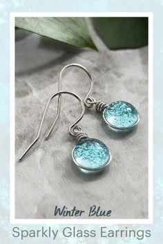 ✨🩵These little sparklers are the perfect addition to your winter styles! Handmade in Central New York, these light aqua tint Glass Earrings are paired with sterling silver wire and ear wires! We have three different ear wires available. Mark your order as a gift and add a personalized gift note at checkout! #ads #etsyaffiliate Adjustable Light Blue Round Earrings, Nickel-free Light Blue Earrings For Party, Blue Round Glass Earrings, Handmade Light Blue Glass Jewelry, Blue Wire Wrapped Round Earrings, Nickel-free Blue Glass Earrings, Blue Glass Earrings For Gift, Blue Wire-wrapped Round Earrings, Handmade Blue Glass Earrings