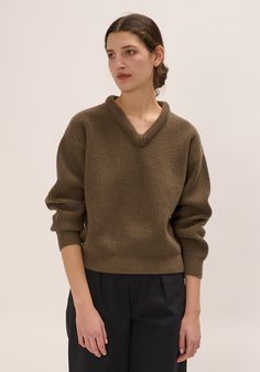 A relaxed fit ribbed sweater in style featuring a v-neckline with slightly puffy edges.    100% wool    photographed in size small:  body length 21"  chest width 22"  sleeve length from shoulder 20" Grad School, Sweater Sale, Engineered Garments, Cashmere Wool, Ribbed Sweater, Work Fashion, Wool Sweater, Women Pullover, Designer Outfits Woman