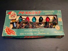 an old fashioned christmas light set in its box