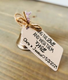 a tag that says bring the best and wash them with love on it sitting on top of a wooden table