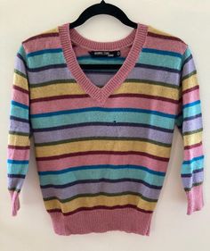 Vintage ESPRIT sweater, branded JASMINE TEAS. Size medium. Fit is shrunken with 3/4 sleeve length. V Neck. Stripe colors are really unique.. so cute! One small moth bite (see photo), otherwise it's in great condition. While in my 20s and 30s I worked as a designer in the fashion industry. Most of my career was spent at Opening Ceremony in New York and then in Philly at Urban Outfitters. I have since hung up that hat, did a total 180, and moved to amish country, Pa. During my time in the fashion world though, I collected some really great inspiration samples and I've decided it's time I open the vault and share my archive with .. you : )  Email me with questions on fit, or anything else. Amish Country Pa, Vintage Esprit, Small Moths, In My 20s, Amish Country, My Career, The Fashion Industry, Fashion Industry, Opening Ceremony