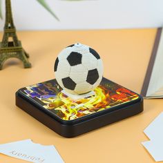 a soccer ball sitting on top of a table