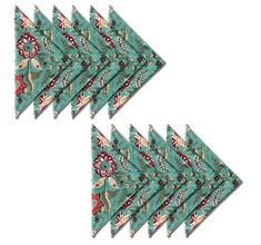 six triangle shaped napkins with designs on them