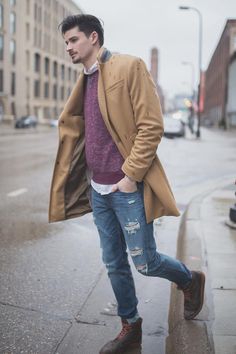 Josiah Davie keeps his look laid back with a pair of distressed jeans and a burgundy crewneck sweater. He keeps warm by adding our camel topcoat | Banana Republic Long Coat With Welt Pockets For Fall, Brown Outerwear With Button Cuffs For Fall, Brown Notch Lapel Outerwear For Fall, Brown Fall Outerwear With Button Cuffs, Brown Long Coat With Welt Pockets, Beige Outerwear With Button Cuffs For Business Casual, Beige Business Casual Outerwear With Button Cuffs, Brown Outerwear With Hidden Button Closure For Winter, Casual Brown Single Breasted Pea Coat