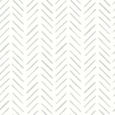 a white and gray pattern with diagonal lines