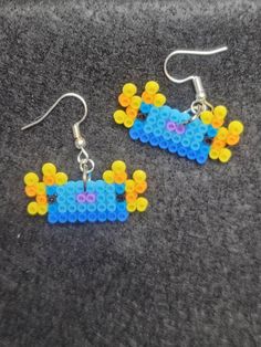 the earrings are made out of legos