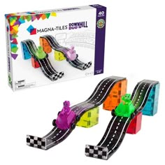 a toy set with cars and tracks in the box next to it's packaging