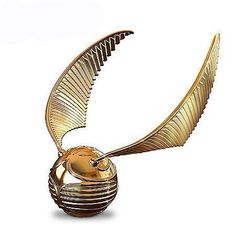 an artistic golden object with wings on it