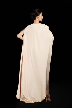 The luxurious silk blend drapes effortlessly and the asymmetrical boat neck adds a touch of sophistication. Perfect for any formal occasion, this dress exudes grace and style.  Length: From 135cm to 140cm Elegant Gown With Draped Sleeves And Asymmetrical Neckline, Pre-draped Silk Evening Dress, Elegant Evening Asymmetrical Floor-length Dress, Elegant Draped Dresses For Banquet, Elegant Floor-length Asymmetrical Formal Dress, Formal Pre-draped Silk Crepe Dress, Silk Asymmetrical Dress With Draped Sleeves For Party, Elegant Asymmetrical Dress With Draped Sleeves, Elegant Silk Crepe Maxi Dress For Gala