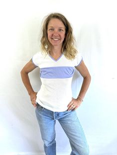 Great vintage condition,  Nordstrom Active Sports Super soft! No size Lying flat... 19" armpit to armpit 25" top to bottom Retro V-neck Stretch Top, Retro V-neck Relaxed Fit Top, White Vintage Stretch Top, Retro Stretch V-neck Top, 90s Fitted Sports Tops, Retro Cotton V-neck Tops, Retro Relaxed Fit V-neck Top, Retro V-neck Top With Relaxed Fit, Sporty Summer