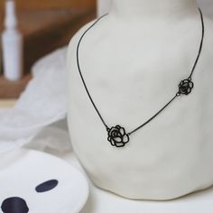 ✦ Embrace the romantic allure of our Roses Clavicle Necklace, featuring one small and one big rose pendant, available in either elegant gold or sleek black. Plated in luxurious 18K gold, this necklace exudes timeless charm and sophistication. Elevate your ensemble with the delicate beauty of roses, perfect for adding a touch of romance to any outfit.----------- DETAILS ------------ Color: Gold/ Black- Chain Length: 37cm- Materials: 18K Gold Plated, Titanium Steel- SKU: P541 Delicate Black Necklace For Gift, Elegant Black Flower Pendant Necklace, Elegant Black Necklace With Flower Pendant, Elegant Black Jewelry With Rose Design, Black Necklace With Rose Design As Gift, Black Necklace With Rose Design For Gift, Rose Choker, Delicate Beauty, Rose Pendant