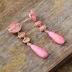 Get the Charming Bohemian beauty inspired by Nature with our new " Lilly Pink Dangle Earrings", Hand made with Semi precious Natural stones with Fancy pink Colors   Features & Specifications Material : Semiprecious Stone, Metal Making Technics : Full Handmade Size : Around 5.5-6cm Product condition : 100% New and Exquisite Quality. Bohemian Teardrop Pink Earrings, Pink Teardrop Bohemian Jewelry, Bohemian Pink Teardrop Jewelry, Pink Bohemian Jewelry With Ear Wire, Pink Bohemian Drop Earrings, Bohemian Pink Jewelry With Ear Wire, Bohemian Pink Drop Earrings, Pink Teardrop Earrings With Natural Stones, Pink Bohemian Earrings For Gift