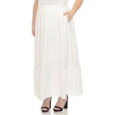 Elevate your fashion game with this flowy and effortlessly chic skirt. This maxi skirt from White Mark boasts a pleated design that adds texture, movement, and a touch of sophistication to your look. Dress it up or down as this skirt is incredibly versatile. Pair it with a tucked in blouse and heels for a sophisticated look or go for a more relaxed vibe with a tucked in tee and sandals and pair it with a jacket on chilly days. It’s perfect for various occasions and style preferences. White Maxi-length Bottoms For Day Out, White Maxi Length Bottoms For Day Out, White Maxi Bottoms For Day Out, White Maxi Length Lined Bottoms, White Maxi Length Bottoms With Lined Skirt, White Gathered Maxi Skirt, White Maxi Length Skirt For Day Out, White Relaxed Maxi Skirt, White Maxi Skirt For Day Out