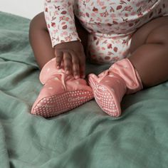 Your baby girl will love these comfortable, pink booties with white heart pattern and poly-fleece lining designed to keep her little feet warm. Featuring a non-skid cotton canvas sole to provide extra balance support and secured with an extra-large hook and loop strap, these baby booties give a comfortably secure feel. A heel loop makes it easy to remove them when needed and minimizes wear and tear on the booties. Our essentials have been independently certified with STANDARD 100 by OEKO-TEX® so Pink Booties, Gerber Baby, Pink Hearts, Fabric Tape, Heart Pattern, White Heart, Baby Booties, Toddler Sizes, Pair Of Pants