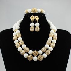 Make your wedding day truly memorable with our custom-made bridal jewelry set. Elegant Pearl Bridal Sets For Weddings, Elegant White Jewelry For Formal Occasions, Elegant Gold Jewelry Sets For Marriage, Elegant Pearl Bridal Sets For Formal Occasion, Gold Beaded Bridal Accessories For Formal Occasions, Classic White Jewelry Sets With Elegant Design, Elegant Pearl Jewelry Sets For Wedding, Classic White Jewelry Set With Elegant Design, Elegant White Jewelry Sets For Formal Occasions