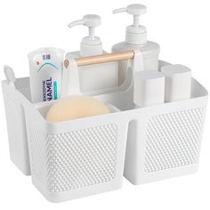 a white bathroom caddy with soap and lotion