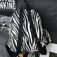 Unleash your wild side with our Animal Print Backpack, where trendy design meets functionality. Inspired by Harajuku fashion, this bold backpack features a striking animal print that makes a statement. With ample storage space for your essentials—whether it’s textbooks or tech gadgets—and adjustable, ergonomic straps for comfort, this backpack is perfect for those who love blending style with practicality. Whether you're hitting the city streets or relaxing at a cafe, this Harajuku-inspired back Cow Print Bag, Harajuku Japan, Harajuku Aesthetic, Aesthetic Backpack, Aesthetic Bags, Women's Backpack, Girl Backpacks School, Patterned Backpack, Retro Cats