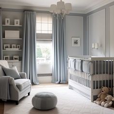 a baby's room with grey walls and white furniture