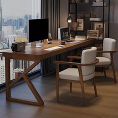 a desk with two chairs and a computer on top of it in front of a large window