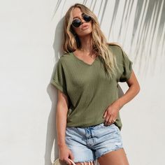 Elevate your everyday style with the Cupshe Women's Olive Green Waffle Knit Tee. This top combines effortless elegance with ultimate comfort, making it a must-have in your wardrobe.

- Size: XL
- Color: Olive Green
- Material: Waffle Knit Fabric
- Gender: Female
- Age Group: Adult

Designed for a relaxed fit, this tee is perfect for those laid-back days where comfort meets style. The waffle knit fabric not only adds a touch of texture but also ensures breathability and softness. Whether you're r Spring V-neck Knit T-shirt, Spring Knit V-neck T-shirt, Summer Tops With Ribbed Neckline For Day Out, Summer Waffle Knit Short Sleeve T-shirt, Casual Solid Color T-shirt For Vacation, Casual Short Sleeve Knit Top, Comfortable Relaxed Fit Tops For Day Out, Trendy Short Sleeve Knit Top For Loungewear, Comfortable T-shirt For Spring Day Out