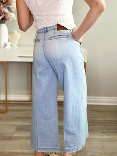 Update your summer wardrobe with our NORI CROPPED WIDE LEG DENIM TROUSER - LIGHT BLUE! These on-trend trousers are perfect for warm weather, with a light color that adds a touch of casual elegance. The cropped fit allows for styling versatility with sneakers, flats, or sandals. Soft denim making it comfy to wear while still embracing a stylish and effortless look! Details denim trousers light blue wide leg cropped 26" inseam button and zipper closure front side pockets back pocket detail for loo Denim Details, Denim Trousers, Wide Leg Denim, Casual Elegance, Pocket Detail, Summer Wardrobe, Warm Weather, Wide Leg, Light Blue