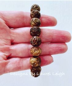 Brown Carved Horn Beaded Bracelet - Designs by Laurel Leigh Bracelets Stacked, Wooden Beaded Bracelets, Porcelain Beads, Beads Bracelets, Statement Bracelet, Latex Free, Bracelet Stack, Hand Beading, Wooden Beads