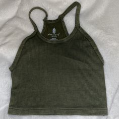 Free People Happiness Runs Tank In Olive Green, Size Xs/S. Free People’s Fastest Selling Tank, Made Of 73% Nylon, 27% Spandex. Small Snag At Top, See Last Picture. Bundle With Other Colors For A Discount. Nwot Green Casual Crop Top For Yoga, Fitted Green Crop Top For Everyday, Everyday Green Seamless Crop Top, Green Cotton Tank Top For Yoga, Casual Green Crop Top For Workout, Free People Tops, Olive Green, Dark Green, Free People