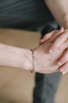 Silver tone Figaro link chain bracelet for men. Clasp closure. - Chain material: Stainless steel (waterproof) - Length: The bracelet in the photos is 7.5 inches long (19 cm). If you would like a different length, please choose your option from the dropdown menu. -Width: 0.15 inch (4mm) This bracelet is great as a gift for a man or a boy. All of our jewelry comes wrapped and ready for gift giving! Visit our shop for more similar items: http://www.etsy.com/shop/principles Minimalist Cuban Link Bracelet With Box Chain, Solid Cuban Link Bracelet As Gift, Modern Cuban Link Bracelet As A Gift, Modern Cuban Link Chain Bracelet As Gift, Minimalist Silver Cuban Link Bracelet, Modern Hypoallergenic Link Chain Bracelet, Gift Cuban Link Box Chain Bracelet, Modern Silver Cuban Link Bracelet As Gift, Modern Cuban Link Silver Chain Bracelet Gift