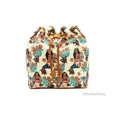 Style: Dooney & Bourke Disney's Moana Bucket Drawstring Bag Material: Printed Coated Cotton Features: Inner Zip and Slip Pockets, Adjustable/Detachable Crossbody Strap, Detachable Top Handle Shoulder Strap, Canvas Lined, Bottom Studs Measures: 10" W x 10" H x 7" D Size: M.  Color: Beige.  Gender: female.  Age Group: adult. Disney Shoulder Bag With Adjustable Strap For Travel, Brown Disney Backpack, Travel Shoulder Bag With Case Included, Crossbody Shoulder Bag For Disney Trips, Disney Style Shoulder Bag For Daily Use, Disney Style Brown Travel Bag, Disney Brown Travel Bags, Dooney And Bourke Disney, Armani Exchange Men