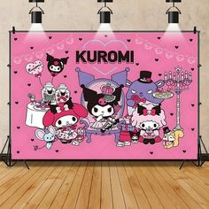 a pink backdrop with cartoon characters on it and the words kuromi written in black