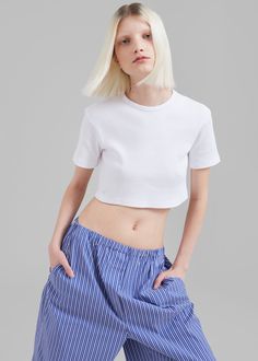 Color: White Lightweight ribbed cotton blend knit Slim fit Cropped profile Crew neckline Ribbed knit trim Unlined 96% Cotton 4% Elastane Dry Clean By The Frankie Shop. Imported The Frankie Shop, Frankie Shop, Cropped Tee, Crop Tee, Crew Neckline, Ribbed Knit, Color White, Dry Clean, Cotton Blend