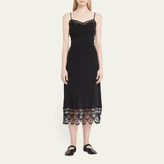 Simone Rocha slip dress with lace trim Sweetheart neckline Adjustable shoulder straps Bias-cut silhouette Midi length Slipover style Acetate/silk Dry clean, professional cleaning recommended Made in Portugal