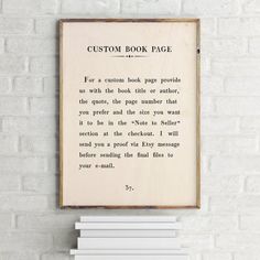 the great gatsby by f scott fitzgerald framed in wooden frame on white brick wall