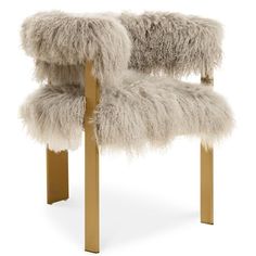 a furry chair with gold legs on a white background