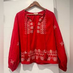 Size Medium Brand New No Tags Red Bohemian Embroidered V-neck Top, Red Bohemian Fall Blouse, Red Long Sleeve Bohemian Blouse, Red Embroidered V-neck Blouse, Red Long Sleeve Cotton Embroidered Top, Red V-neck Blouse With Floral Embroidery, Casual Red V-neck Peasant Top, Red Embroidered Holiday Tops, Casual Embroidered Top For Spring Festive