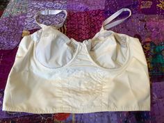 Bra In white crisp nylon taffeta Wired cups sized 95 European vintage sizing Adjustable straps  Column 9 hooks and two rows of row of eyes Cups have one wire running through Vintage sizing is different to modern, so check measurements against well fitting bra Cup 8 inches 20 cm across Vertically 7 inches 17.5 cm Underband 32/34 inches 81/86 below bust Lowest part 30 inches 76 cm Immaculate Elastic still snappy  No odours White Nylon Underwire Bra, White Underwire Nylon Bra, White Fitted Nylon Bra, Fitted White Nylon Bra, White Nylon Bra, White Wedding Bra With Adjustable Straps, Wedding Bra With Removable Cups, Fitted Nylon Bra With Removable Cups, White Fitted Bra With Adjustable Straps