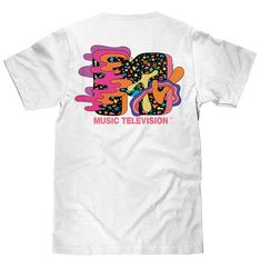 It's Time To Bring Bodacious Back... And yes, we're totally starting with this graphic tee! We've paid tribute to the channel that changed the world with a throwback, 80s art deco inspired t-shirt featuring a subdued MTV logo on the left chest, to a super striking version on the back. To ensure that this retro MTV shirt stands out - we've printed the graphic on a soft, white cotton tee. 100% Cotton Machine Wash Tumble Dry Regular Fit Printed in USA Graphic Tee With Logo For Music Festivals, Graphic Tee With Logo Print For Music Festivals, Retro T-shirt With Text Print For Music Festivals, White T-shirt With Text Print For Music Festivals, White Text Print T-shirt For Music Festivals, White Graphic Tee For Music Festival, 90s Inspired White Graphic T-shirt, 90s Graphic Design Tops For Music Festivals, 90s Graphic Tops For Music Festivals