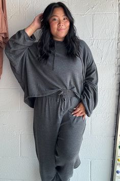 This charcoal grey ultra soft cropped hoodie + joggers set is here to keep you cozy and stylish! Its ultra-soft fabric will make you feel like you're living in a cloud, so you can feel great and look great. What more could you want?! Dani is wearing size 2X for an oversized fit Heather Grey Sweats For Loungewear, Fall, Heather Grey Sweats For Fall Loungewear, Fall Heather Grey Sweats For Loungewear, Gray Sweats For Fall Loungewear, Gray Hoodie Activewear For Loungewear, Cozy Gray Activewear For Fall, Comfortable Gray Hoodie For Loungewear, Comfortable Gray Sweats For Loungewear, Comfortable Gray Activewear For Fall