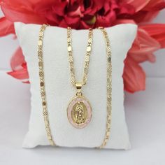 Gold Plated Virgen Of Guadalupe Pendant With Pink Quartz Measures 1 Inch. Includes A 22 Inches Long Chain, Lobster Clasp. Top Quality, Lasts Long And Wont Change Color Or Tarnish. Oro Laminado Medalla Religiosa De La Virgen De Guadalupe Con Quarzo Rosado. Mide 1 Pulgada E Incluye Cadena De 22 Pulgadas Tags: Religious Jewelry, Gift, Birthday, Anniversary, Mothers Day Quince Gifts Ideas, Quince Jewelry Gold, Quince Necklace Gold, Quince Necklace, Virgen Of Guadalupe, Quince Gifts, Pink And Gold Quince, Quinceanera Jewelry, Pink Quince