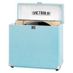 a record player in a blue case with its lid open and the word victoria on it