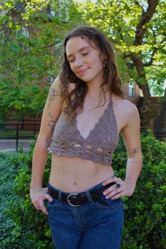 Crochet brown bralette with a tie back and tie neck. Festival Halter Neck Top, Bra Friendly, Festival Bra Friendly Halter Neck Top, Festival-ready Bra-friendly Halter Neck Top, Fitted Brown Halter Neck Crop Top, Festival Halter Neck Crop Top Bra Friendly, Fitted Brown Halter Top For Festivals, Festival Halter Neck Crop Top, Bra Friendly, Brown Crop Top For Beach, Beach Lace Crop Top Bra Friendly