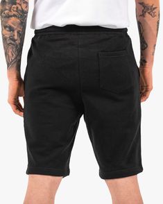 MODEL IS 5'10" WEARING SIZE M 100% cotton Regular fit 2X2 ribbed waistband, tonal external drawcord Back pocket & Jersey lined hand pockets Mid weight, 9.4 oz Preshrunk to minimize shrinkage Sporty Cotton Pants With Built-in Shorts, Cotton Gym Pants, Black Cotton Athletic Shorts With Built-in Shorts, Stretch Cotton Activewear With Pockets, Sporty Short Length Solid Pants, Sporty Solid Color Short Pants, Sporty Short Length Solid Color Pants, Sporty Short-length Solid Pants, Solid Cotton Athletic Shorts For Leisure