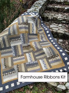 a quilted blanket sitting on the ground next to some stone steps with text overlay that reads farmhouse ribbons kit