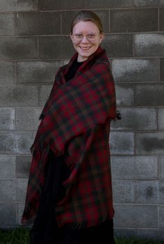 The brown and red plaid, Canadian Maple Leaf tartan blanket scarf can be added to the winter coat you have or wear it to top off that sweater you feel so comfortable in. It makes a great over-sized scarf gift for that special lady on your list. Cozy up your room my tossing this across your favorite chair as a throw. This scarf is made of the same Maple Leaf tartan pattern that the Duchess of Cambridge wore in Canada. More recently Princess Kate wore it on their Royal Tour. Be practical and wear Tartan Blanket Scarf, Tartan Shawl, Air Force Families, Leaf Blanket, Tartan Plaid Scarf, Canadian Maple Leaf, Tartan Blanket, Tartan Scarf, Canadian Maple