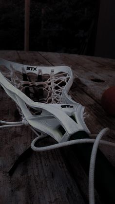 a close up of a lacrosse goal on a table