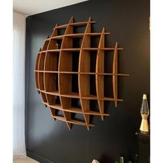 a wooden shelf mounted to the side of a wall