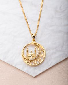 Inspired by the beautiful mosques from all around the world. This necklace features a 2 minaret mosque embossed throughout the design, with a gorgeous curved embezzled line Material: 925 Sterling Silver with 3.0 Microns of Pure 18K gold Chain: 40 CM + 10CM Extension Eid Adha, Arabic Jewelry, Love Couple Wallpaper, Islamic Jewelry, Adha Mubarak, Edgy Jewelry, Mecca Wallpaper, 18k Gold Chain, Eid Gift